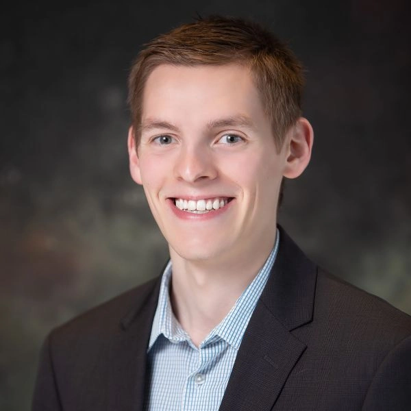 Tanner Comp headshot