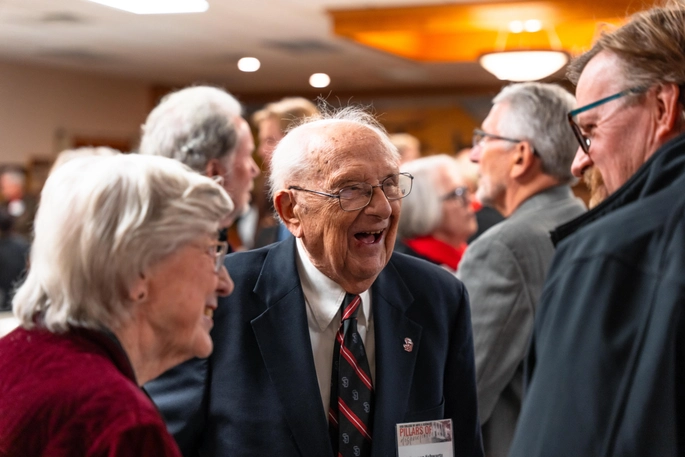 Three people talk at the 2026 Pillars of Distinction College of Arts & Sciences Awards.