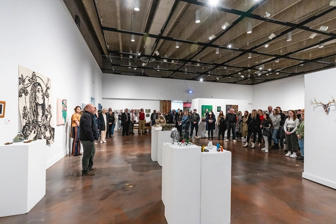 A crowd gathered in the Stilwell art gallery