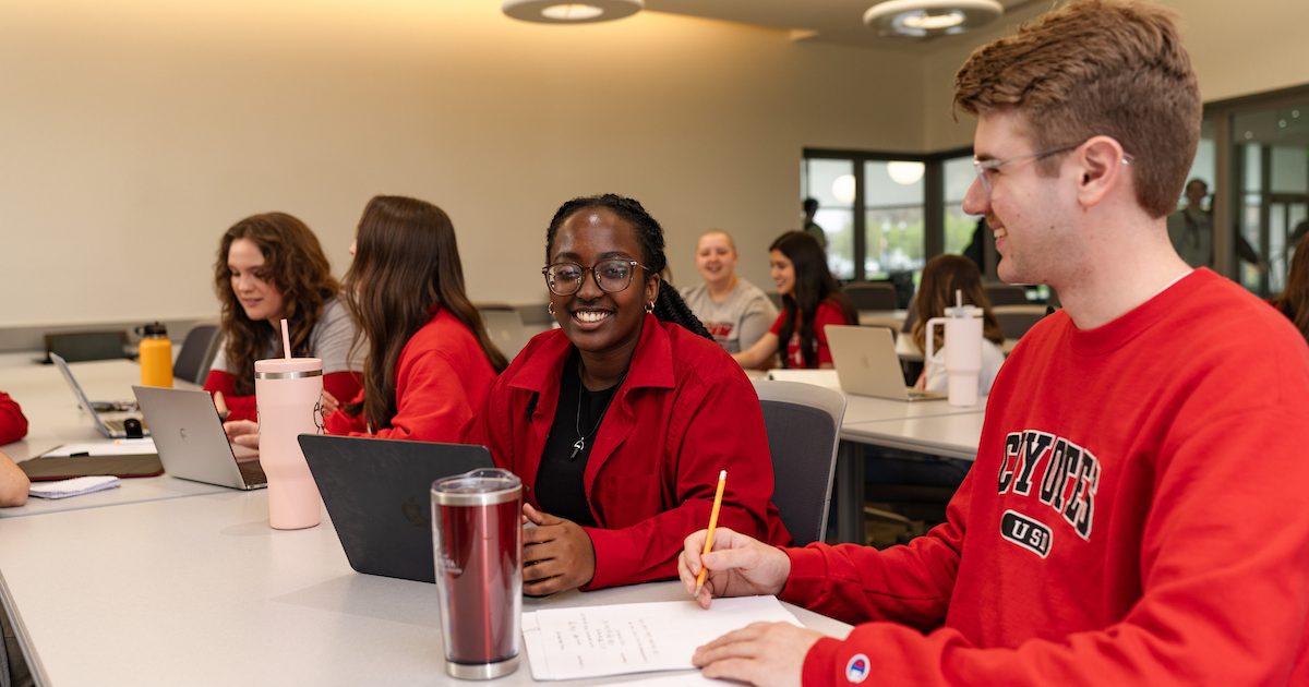 Students in a Beacom classroom