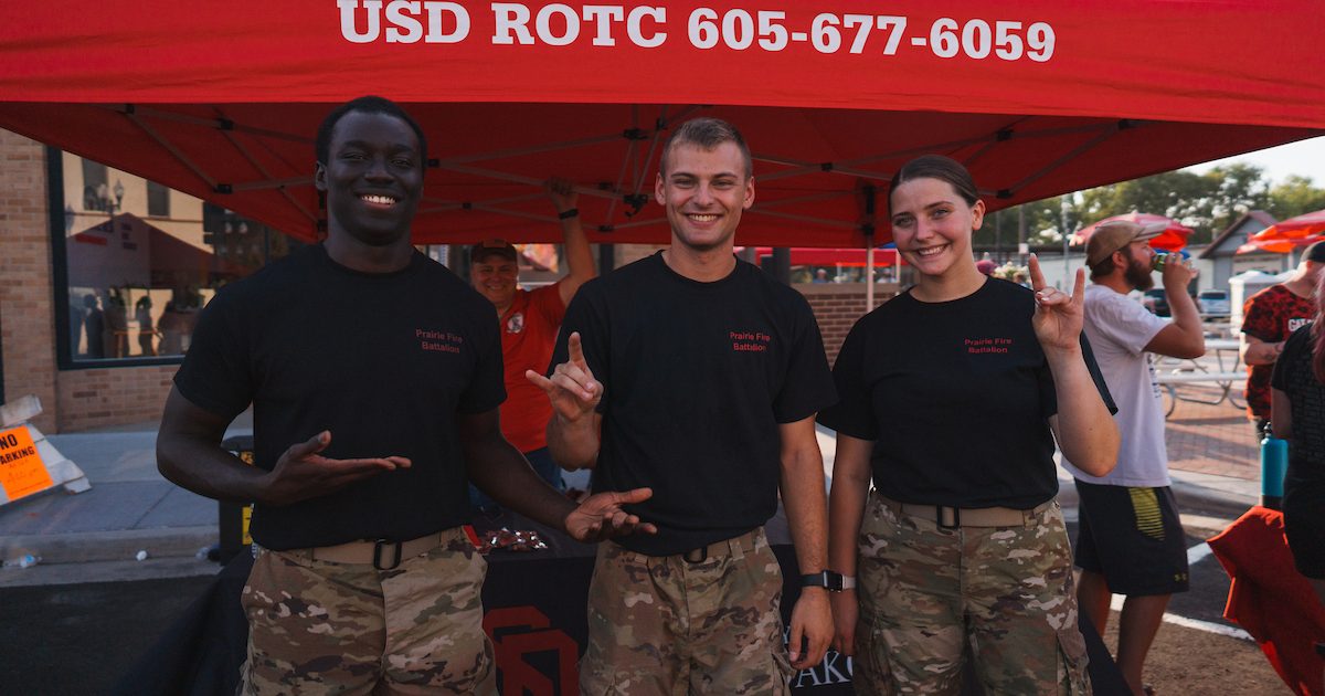ROTC students tabling outside.