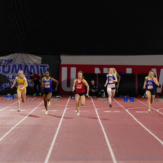 Competitors running at the Track and Field Summit League Championship