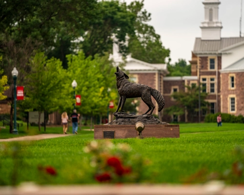 Legacy Statue in front of Old Main
