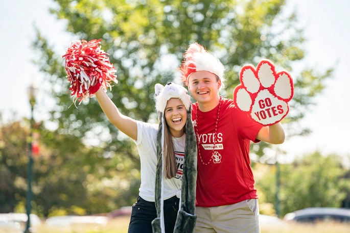 Students posing with USD gear
