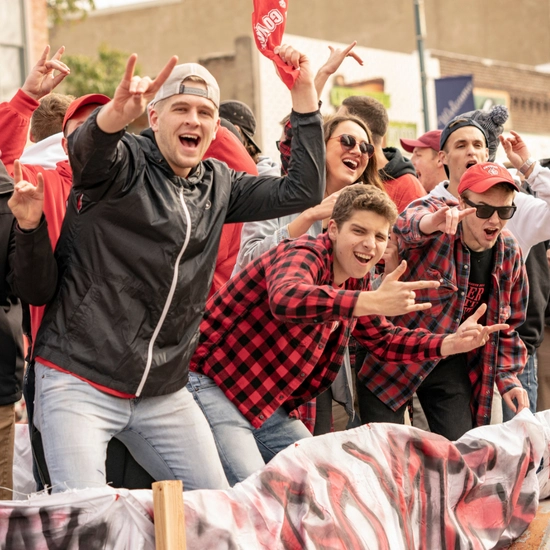 Dakota Days throwback of a group of students riding in the parade
