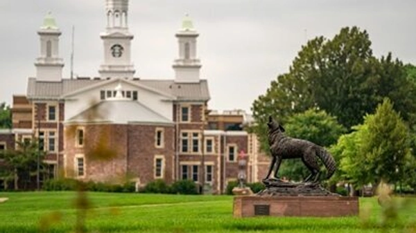 Legacy statue in front of Old Main