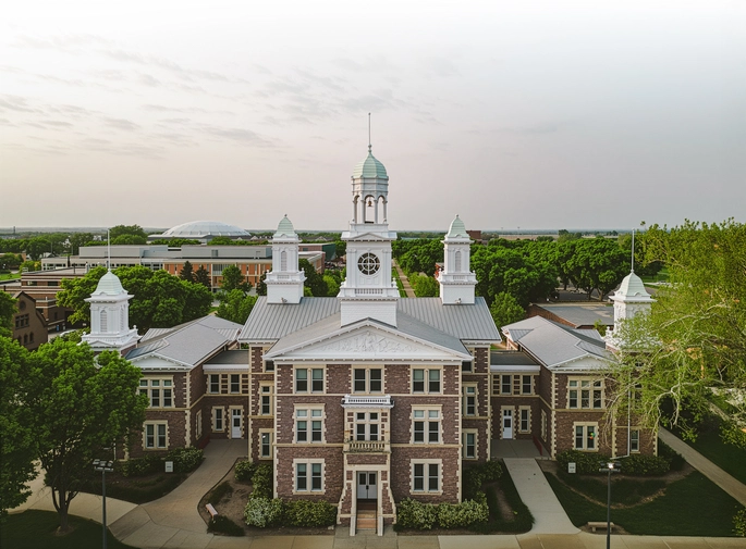 A drone view of old main on USD Campus