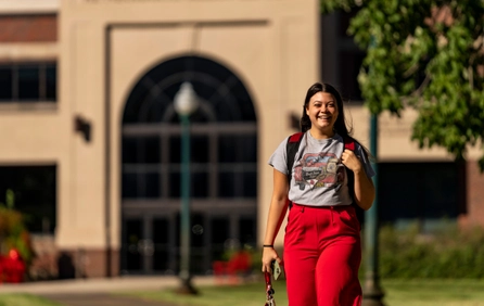 Female student walking on campus