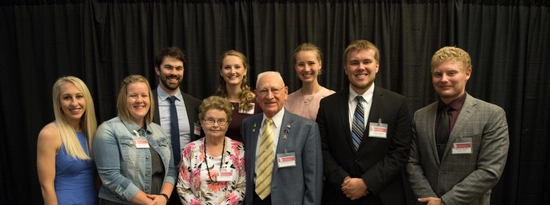 Arnold and Alanna Fenske pose with scholarship recipients at the Sanford School of Medicine scholarship dinner.