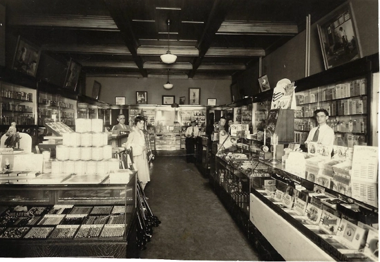 Historic photo of Marshall Davis and others in the Davis Pharmacy