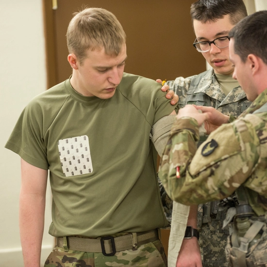 ROTC cadets practice tourniquets