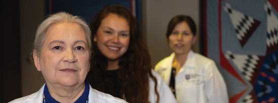Drs. Arna Mora and Carol Whitman pose with their mom Dr. Sophie Two Hawk