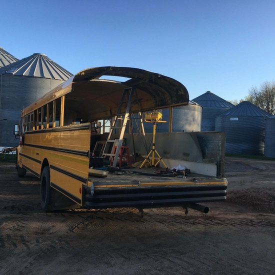 Rear view of bus renovation in progress
