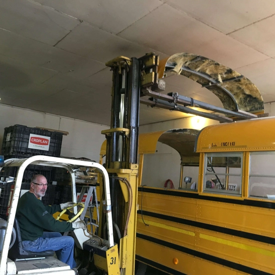 Removing section of bus' roof