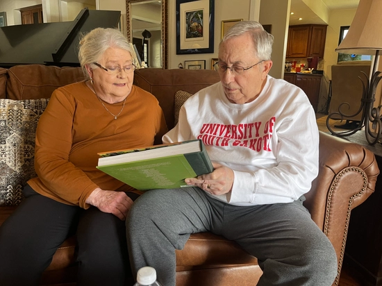 Dr. Vernon and Mrs. Patricia Hermsen signing the gift agreement
