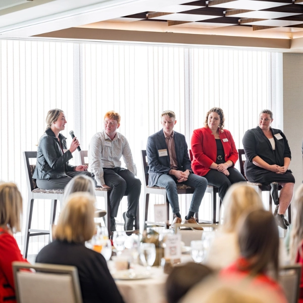 Alumni of the President's Senior Leadership Institute talking on a panel at the Women in Philanthropy Brunch